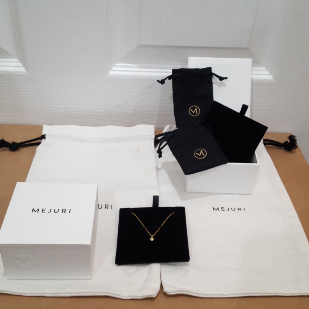 Two Mejuri boxes